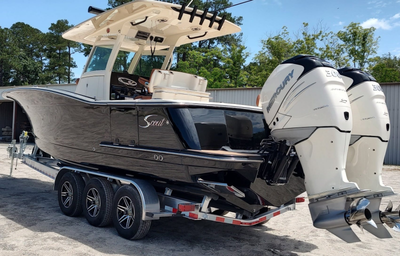 Sleek black custom paint job with Wicked Outboards